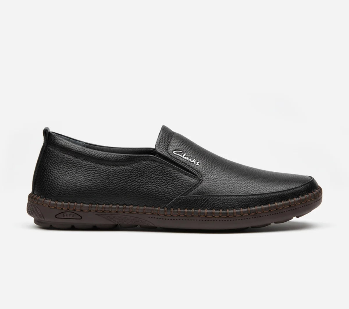 Black slip-on shoe with brand logo on a white background
