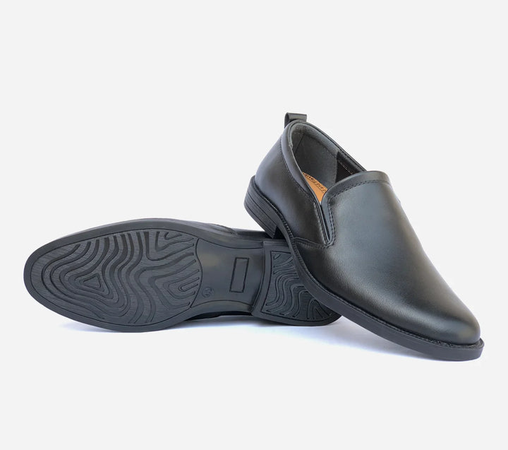 Pair of black shoes on a white background