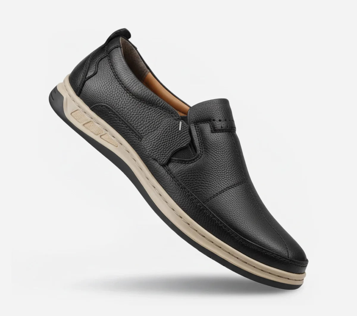 Black leather shoe with beige sole on a white background