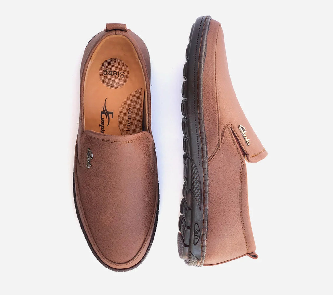 Brown loafers with visible brand logo on a white background