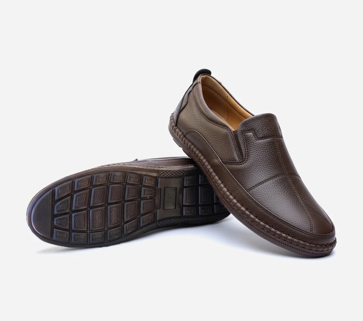 Brown leather shoes on a white background