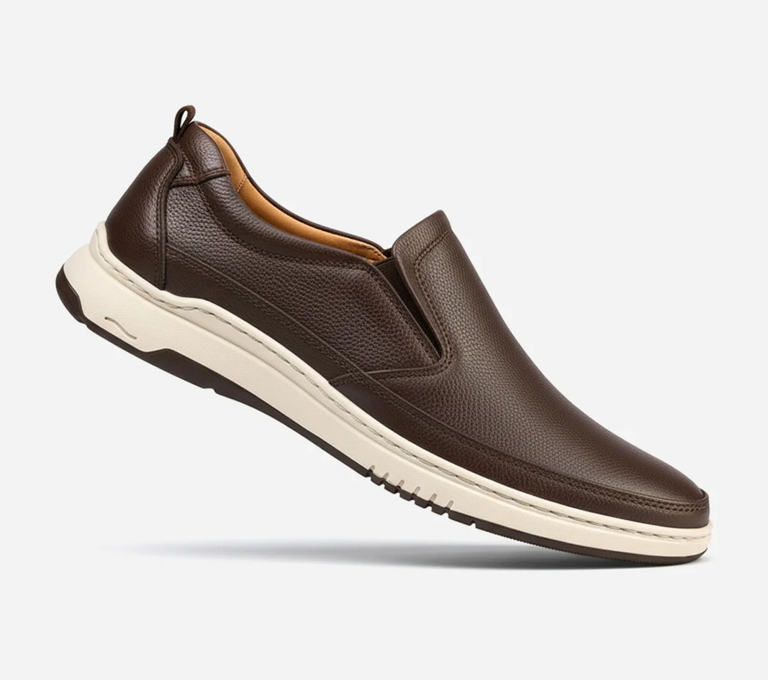 Clarks Brown Slip-on shoes on grey background