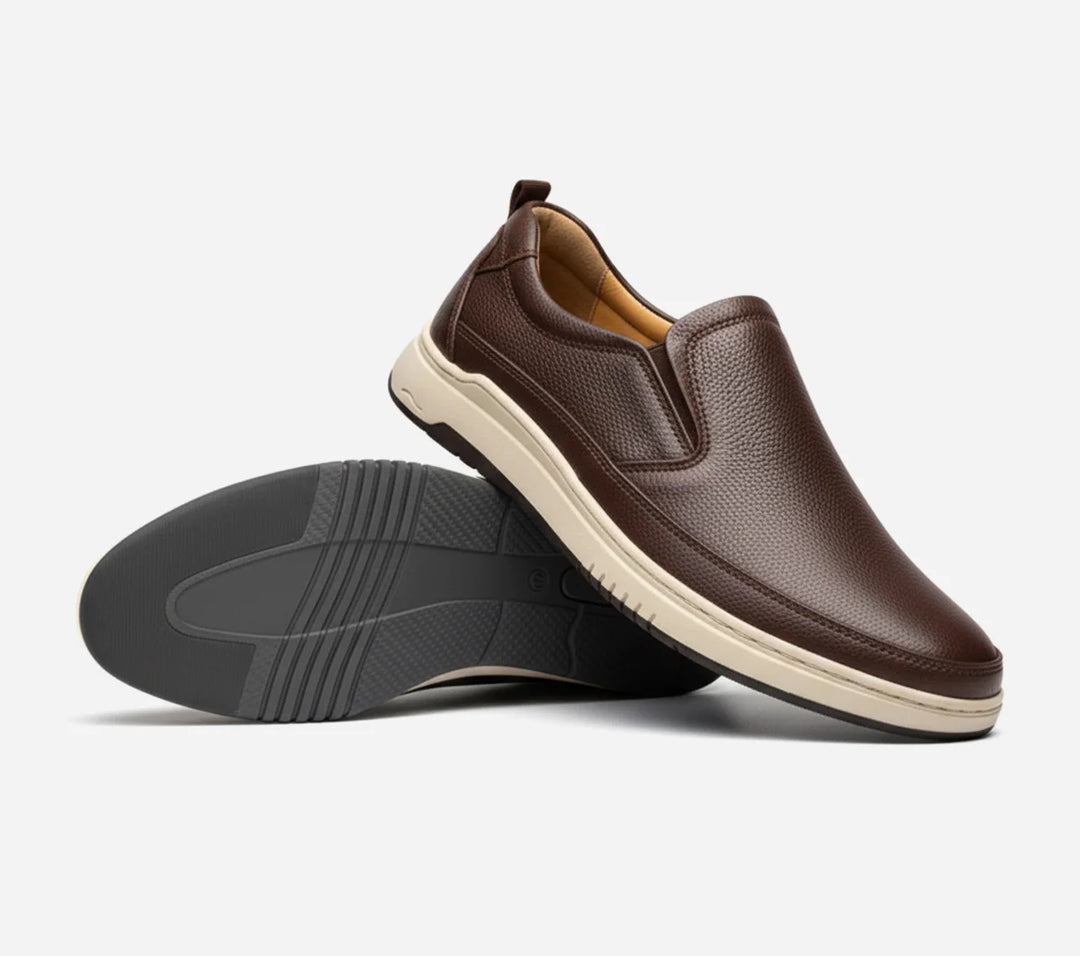 Clarks Brown Slip-on shoes on grey background