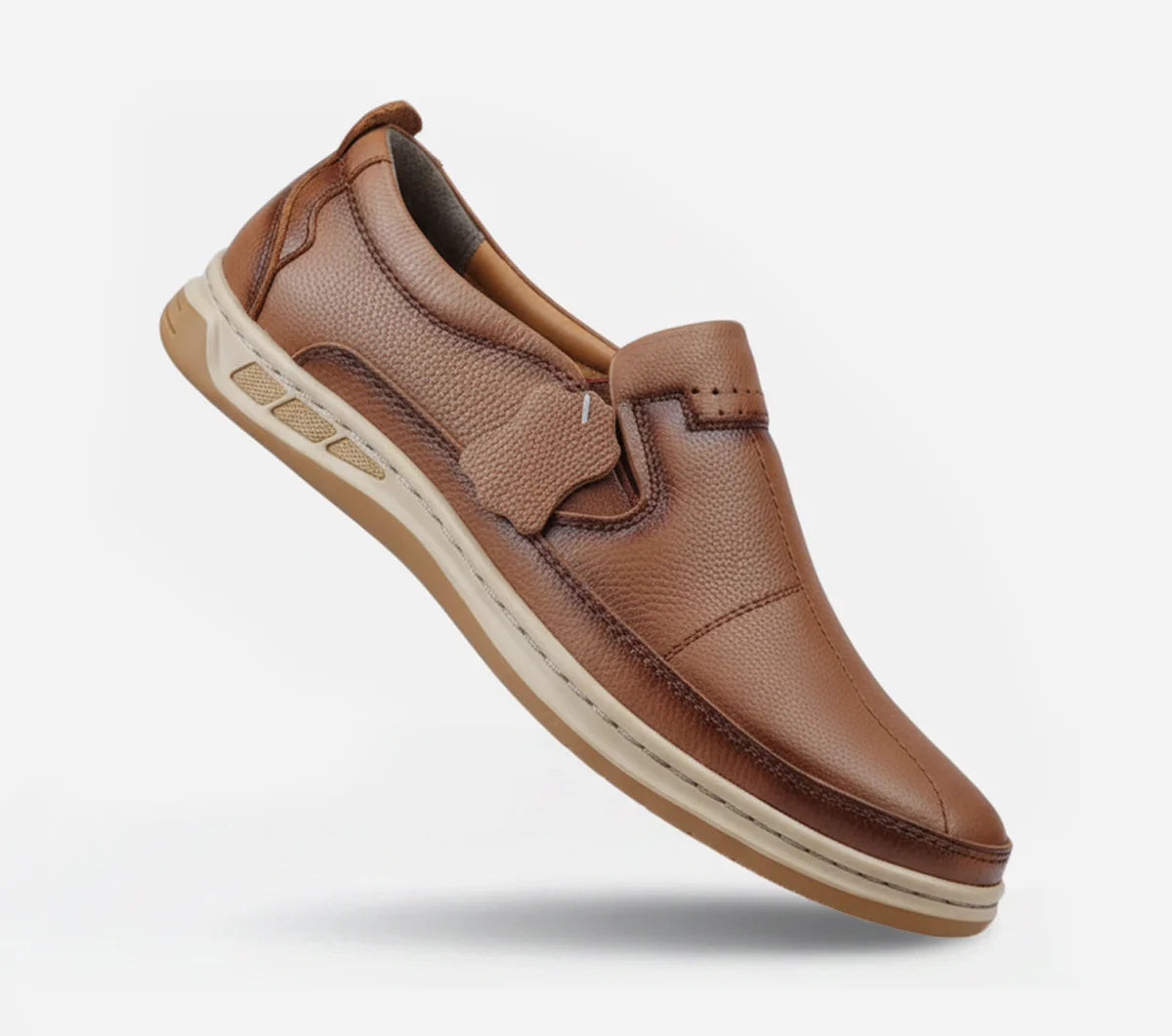 Brown leather shoe on a white background